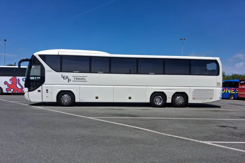 Leap Travel 55-seat Tourliner coach parked at Llandudno
